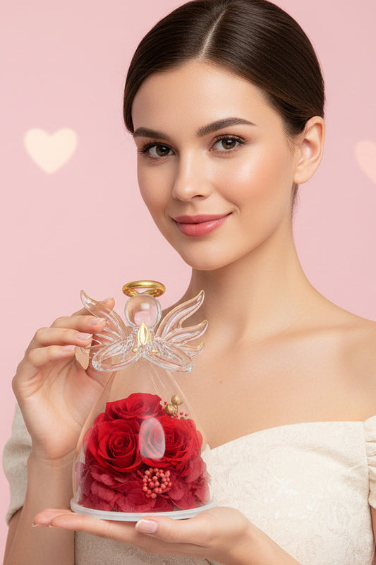 3 Red roses preserved in an angel glass figurine,the perfect gift.