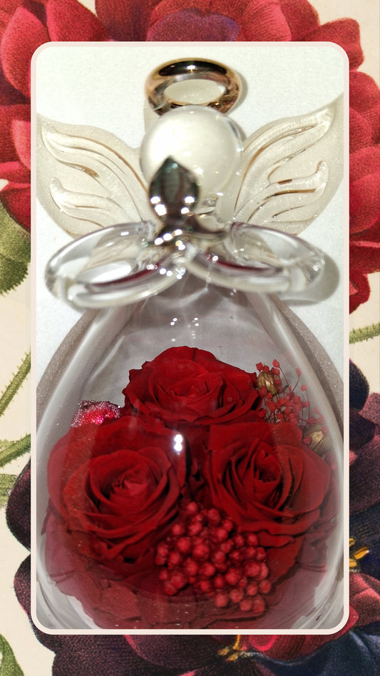 3 Red roses preserved in an angel glass figurine