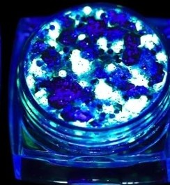 Blue neon glow in the dark glitter for face and body and art nails