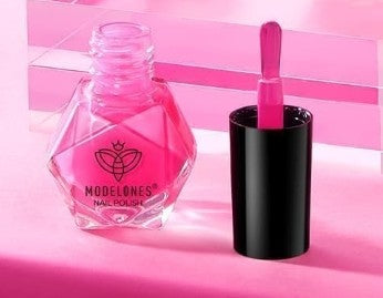 Coral glossy  pink nail polish